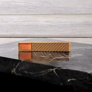 Vintage gold tone bar tie clip